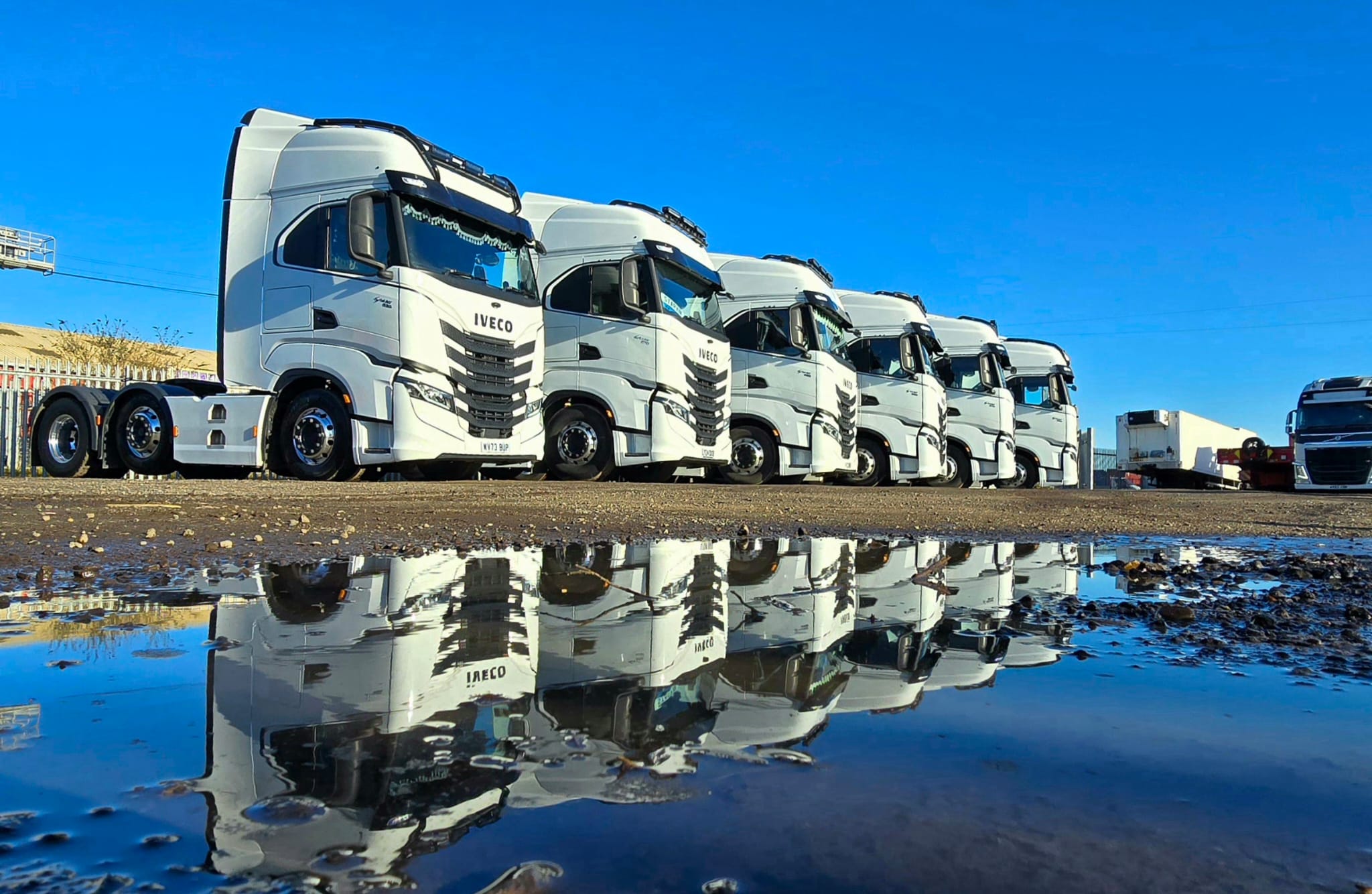 N.D. Transport Solutions fleet lined up in the yard